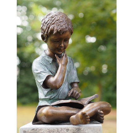 Bronzen beeld Jongen met boek 40x24x32cm