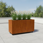 Langwerpige cortenstalen plantenbak met wielen 120x50x60 cm